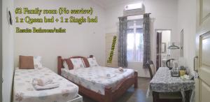 Cama ou camas em um quarto em KC Beachfront