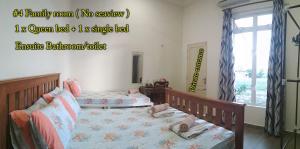 Cama ou camas em um quarto em KC Beachfront