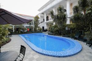 Fotografie z fotogalerie ubytování The Grand Palace Hotel Yogyakarta v destinaci Yogyakarta