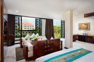 Voodi või voodid majutusasutuse Lotus Blanc Resort toas