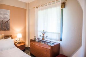 A bed or beds in a room at Eirinis House