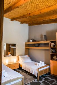 Postel nebo postele na pokoji v ubytování Eirinis House