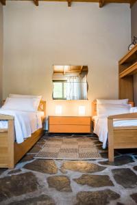 A bed or beds in a room at Eirinis House