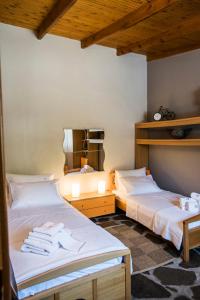 A bed or beds in a room at Eirinis House