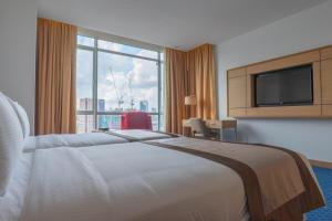Postel nebo postele na pokoji v ubytování Tamu Hotel & Suites Kuala Lumpur