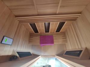 a room with a purple object on the ceiling at Escale beauté le Crotoy in Le Crotoy