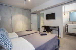 A bed or beds in a room at Kastalys Villa