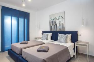 A bed or beds in a room at Kastalys Villa