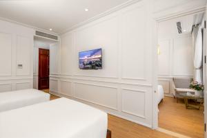 Ліжко або ліжка в номері Menora Grand Da Nang