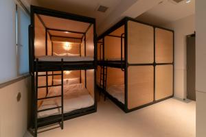 Letto o letti in una camera di Kamon Hotel Namba