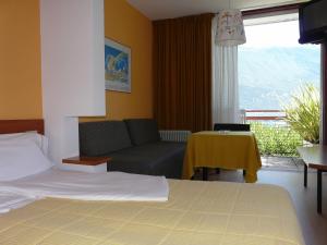 Postel nebo postele na pokoji v ubytování Hotel Lido + 27 fotografií