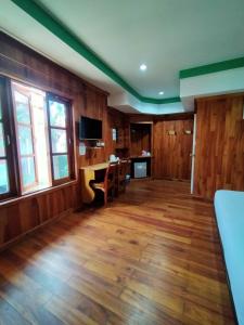 TV a/nebo společenská místnost v ubytování Palmsuay Resort