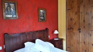 Ein Bett oder Betten in einem Zimmer der Unterkunft Posada La Vieja Escuela