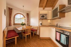 Kuchyňa alebo kuchynka v ubytovaní Tischlerhof - Typ A mit Balkon