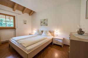 Posteľ alebo postele v izbe v ubytovaní Tischlerhof - Typ A mit Balkon