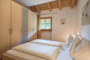 Posteľ alebo postele v izbe v ubytovaní Tischlerhof - Typ A mit Balkon