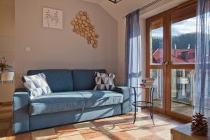 Posedenie v ubytovaní Aba Apartamenty