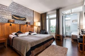 Postel nebo postele na pokoji v ubytování Finlandia Hotel Imatran Kylpylä Spa