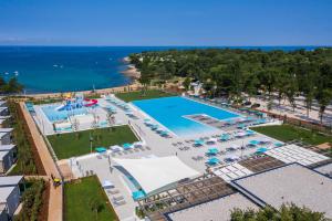 an aerial view of a resort with a pool at Camping Park Umag Mobile Homes in Umag