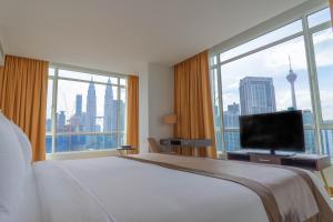 TV a/nebo společenská místnost v ubytování Tamu Hotel & Suites Kuala Lumpur