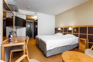 Postel nebo postele na pokoji v ubytování Finlandia Hotel Imatran Kylpylä Spa