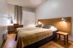 Postel nebo postele na pokoji v ubytování Finlandia Hotel Imatran Kylpylä Spa