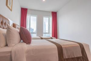 Postel nebo postele na pokoji v ubytování Tamu Hotel & Suites Kuala Lumpur