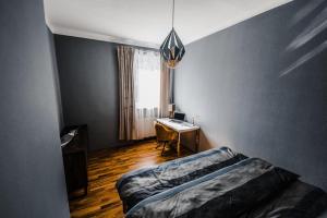 Łóżko lub łóżka w pokoju w obiekcie Design-Appartement Steyr