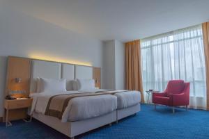 Postel nebo postele na pokoji v ubytování Tamu Hotel & Suites Kuala Lumpur