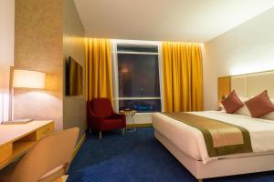 Postel nebo postele na pokoji v ubytování Tamu Hotel & Suites Kuala Lumpur