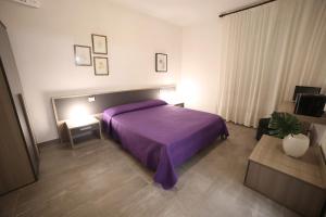 Postel nebo postele na pokoji v ubytování LOCANDA Roma sleep & food