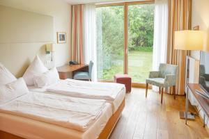 Postel nebo postele na pokoji v ubytování FREIgeist Northeim