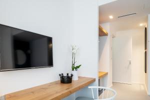 TV a/nebo společenská místnost v ubytování Near Ortigia