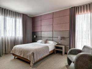 
Cama o camas de una habitación en Hotel Pensua Punta del Este
