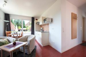 Kuchyň nebo kuchyňský kout v ubytování De Kanalkieker Apartmenthaus Meier