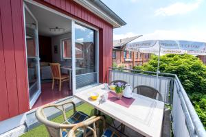 Balkón nebo terasa v ubytování De Kanalkieker Apartmenthaus Meier