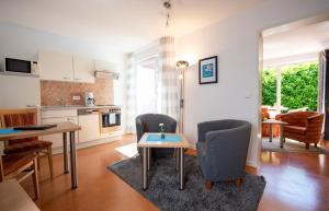 Kuchyň nebo kuchyňský kout v ubytování De Kanalkieker Apartmenthaus Meier