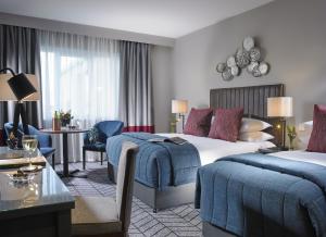 Voodi või voodid majutusasutuse Fairways Hotel Dundalk toas
