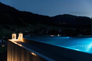 The swimming pool at or close to GOING TRIPLE A apartments EAST