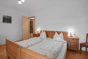 Postel nebo postele na pokoji v ubytování Rafaser - Apartment Rustika