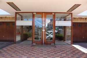 an entrance to a building with revolving doors at MoTown by Mojo in Cape Town