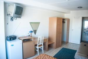 Kuchyň nebo kuchyňský kout v ubytování Carolina Hotel