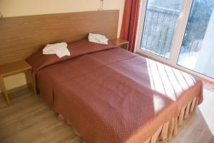 Postel nebo postele na pokoji v ubytování Carolina Hotel