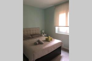 Posteľ alebo postele v izbe v ubytovaní Piso Exterior Centro de León