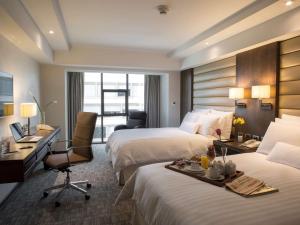 Letto o letti in una camera di Swissotel Lima