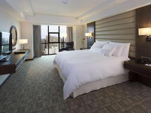 Letto o letti in una camera di Swissotel Lima