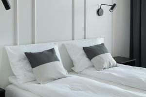 Posteľ alebo postele v izbe v ubytovaní City Break Gdańsk Rajska 8 Apartamenty