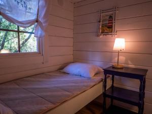 מיטה או מיטות בחדר ב-Villa Kommodor
