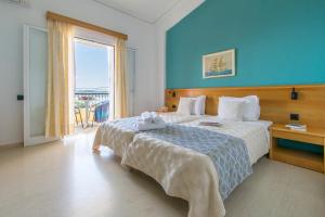 Postel nebo postele na pokoji v ubytování Elite Corfu - Adults Friendly + 37 fotografií