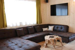 Posezení v ubytování Chalet Glemmtal - Haus Schmittenblick